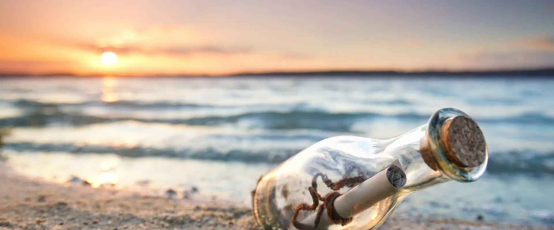 bottle post on a beach
