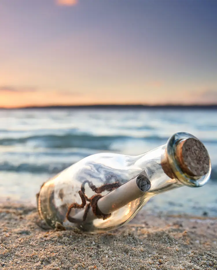 bottle post on a beach